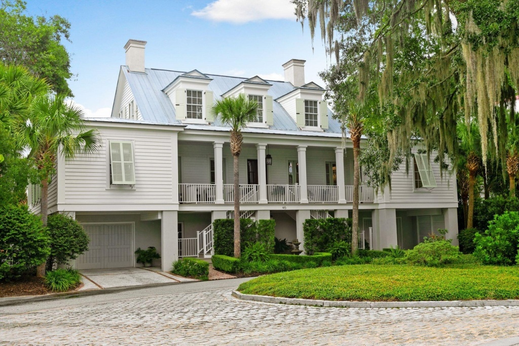 White farmhouse with exuding southern charm and all aspects of life in the Lowcountry